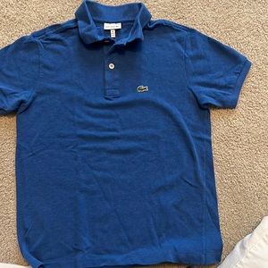 Boys Lacoste polo shirt in excellent condition. The pique material wears well.